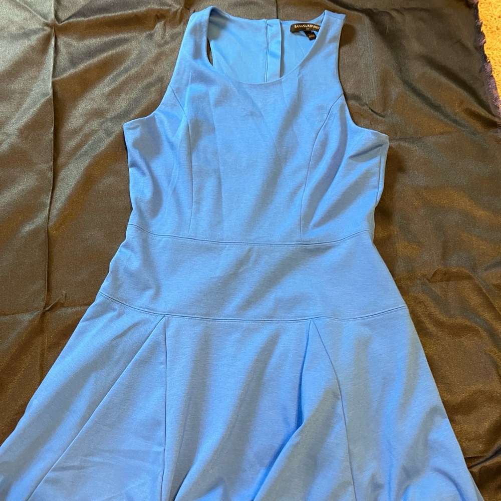 Accentuate your shoulders in this great dress! Fitted top with flared skirt!